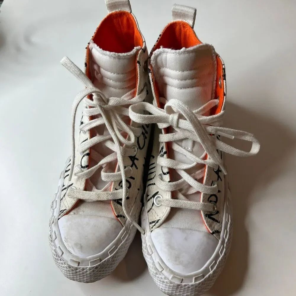 Converse Chuck Taylor All-Star 70 Hi "Not a Chuck" sneakers bold black text on w